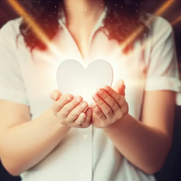 Mulher simbolizando autocompaixão em um ambiente acolhedor.