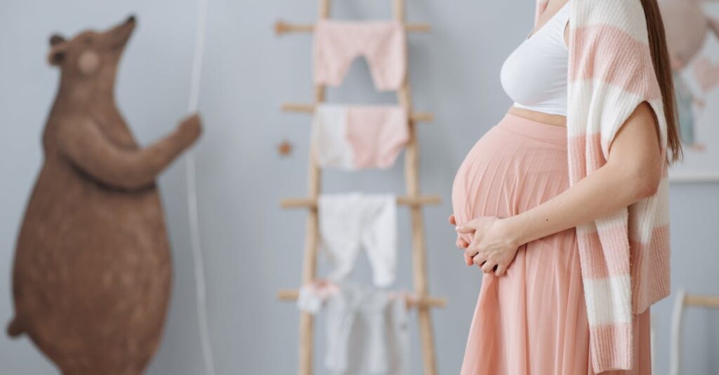 Expectant mother caressing her belly in a cozy nursery room setting, symbolizing love and anticipation.