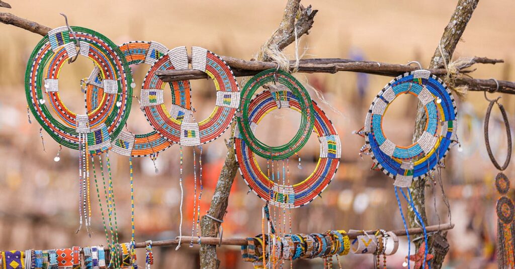 Vibrant Maasai beaded jewelry displayed on wooden racks in Ngorongoro, Tanzania.