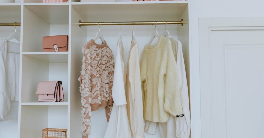 Neat closet showcasing white and pink clothes and accessories for a chic, clean look.