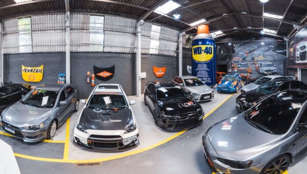 Panoramic view of Vila Nair garage filled with sports cars in São Paulo, Brazil.