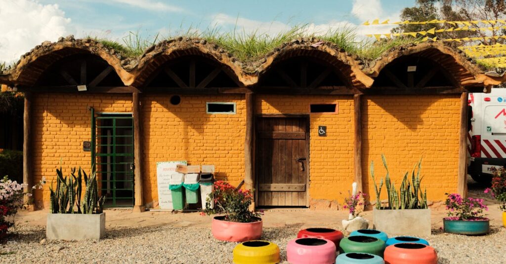 Vibrant outdoor structure with eco-friendly green roof and colorful decorations, showcasing sustainable architecture.