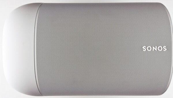 Top view of a sleek wireless speaker with a minimalistic design.