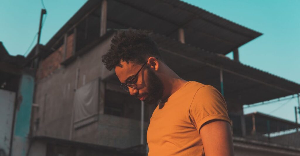Portrait of a man with a beard and glasses in Rio de Janeiro, Brazil's urban environment.
