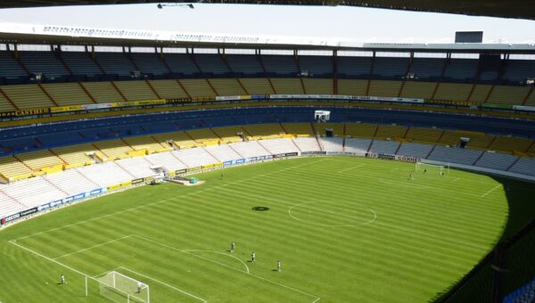 Spacious soccer stadium with green field in Jalisco del Refugio, Mexico.