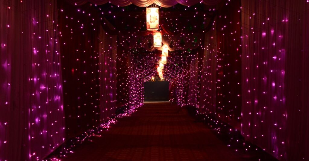 A mesmerizing corridor lit with vibrant purple lights creating a magical ambiance indoors.